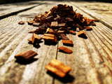 Western BBQ Products Hickory Smoking Wood Chips lifestyle photo — close-up beauty shot of raw hickory wood chips