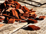 Western BBQ Products Mesquite Smoking Wood Chips lifestyle photo — close-up beauty shot of raw mesquite wood chips