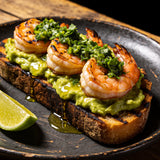 El Chori Zesty Coriander Chimichurri — smashed avocado toast with grilled prawns and coriander chimichurri