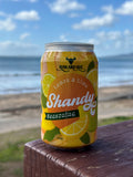 Rum and Que Shandy rub at the beach