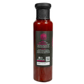 Booma's BBQ Boomtang sweet and tangy BBQ sauce, 250ml bottle angled label view