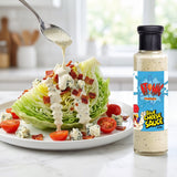 Atomic Chicken Blue Cheese Sauce — iceberg wedge salad drizzled with blue cheese dressing, bacon and tomato