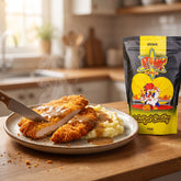 Atomic Chicken Schnitzel Original Coating — golden crumbed chicken schnitzel sliced, served with mash and gravy
