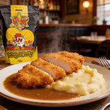 Atomic Chicken Chicken Schnitzel Original Coating 450g — crumbed schnitzel sliced, served with mashed potato and gravy