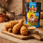 Atomic Chicken Gluten Friendly Southern Fried Chicken Coating — crispy fried drumsticks on a board with dipping sauce