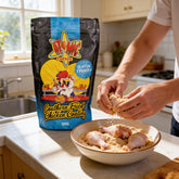 Atomic Chicken Gluten Friendly Original Southern Fried Chicken Coating 500g — hands dredging raw chicken drumsticks in the coating