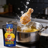 Atomic Chicken Original Southern Fried Chicken Coating 500g — coated drumstick frozen mid-drop into hot frying oil