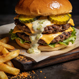 Bangin Burger Box - double smash cheeseburger with creamy burger sauce and golden zucchini pickles, seasoned chips alongside