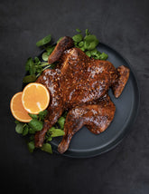 Barbecue Fusion by Adam Roberts hardback cookbook — glazed spatchcock chicken with orange