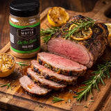 Barbecue Mafia On the Lamb BBQ Rub — rosemary and citrus roast lamb sliced to a rosy pink centre beside the pack