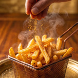 Barbecue Mafia The Oath Chip Seasoning 270g — seasoning sprinkled over a basket of hot golden chips