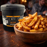 Barbecue Mafia The Oath Chip Seasoning 2kg — a big bowl of golden seasoned wedges beside the catering tub