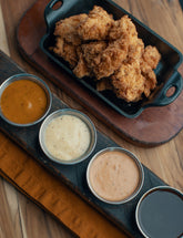 BBQ Revolution by Mitch Benjamin hardback cookbook — interior page of 'Bama white sauce and Carolina Gold dipping sauces