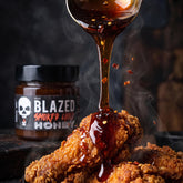 Blend Blazed Smoked Chilli Honey 250g — chilli honey pouring over hot fried chicken