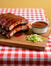 Pork ribs lacquered with Booma's BBQ Boomtang sweet and tangy BBQ sauce