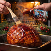 Christmas Candy glaze brushed onto a scored Christmas ham