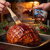 Christmas Candy glaze brushed onto a scored Christmas ham
