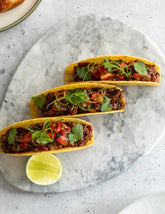 ChamCham Hot Bae hot sauce on salmon tacos