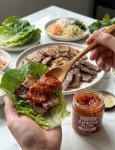 ChamCham Kimchi Relish served with BBQ meat