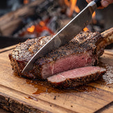 Chuds BBQ SPG 235g salt, pepper and garlic seasoning — a seared ribeye sliced to a juicy rosy interior with a peppery crust