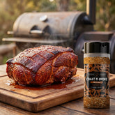 Coast n Smoke South West rub — whole smoked pork shoulder with a brick-red smoked-paprika bark on a board