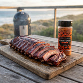 Coast n Smoke The Rip rub — smoked pork ribs with mahogany bark sliced on a board at a Surf Coast cook-up