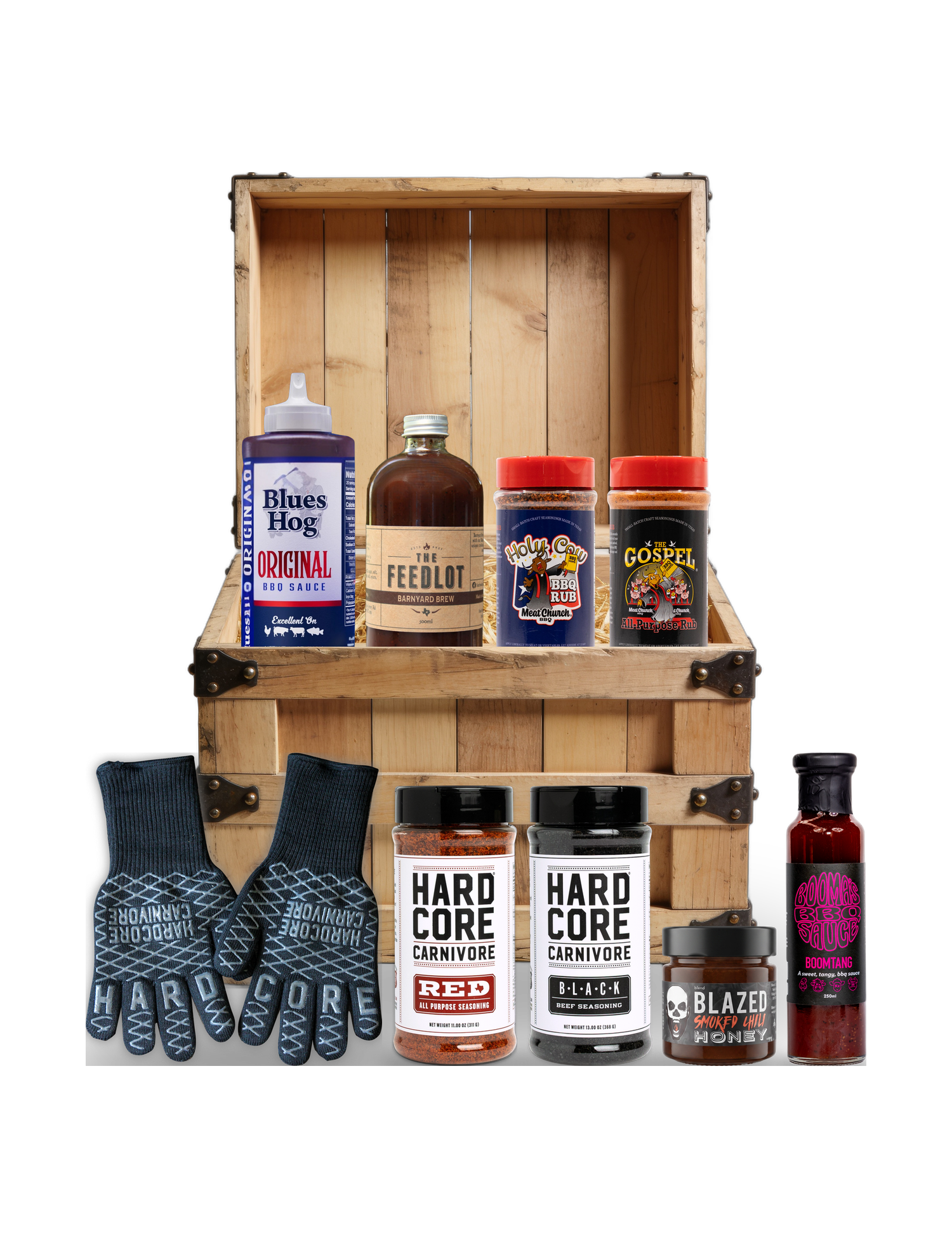 The Rub Hub The Kingpin BBQ subscription box — example crate with Blues Hog, The Feedlot, Meat Church, Hardcore Carnivore rubs and gloves, BLEND honey and Boomtang — contents change monthly, on transparent background