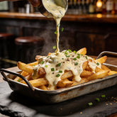 Smokes Seasoning Cowboy Butter Ranch drizzled over loaded fries