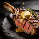 Smokes Seasoning Cowboy Butter Ranch melting over a seared steak