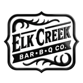 Elk Creek Bar-B-Q Co. brand logo, ornate black crest with flourishes, white glow on transparent background