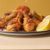 Citrus-crusted chicken drumsticks seasoned with Ember Republic Leopard Veldfire Citrus