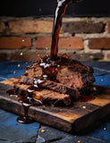Fancy Hank's Coffee & Molasses BBQ Sauce poured thick over sliced beef brisket