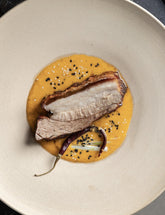 Fire Kitchen by Adam Roberts hardback cookbook — crisp pork belly on a golden sauce with chilli