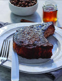 Food by Fire by Derek Wolf hardback cookbook — honey espresso-glazed pork chops recipe