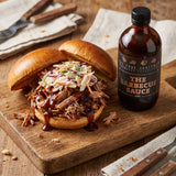 Four Saucemen The BBQ Sauce - open pulled-pork slider with sauce and slaw