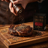 Four Saucemen Pohutukawa Smoked Peppercorns - freshly ground pepper over a rested steak