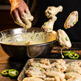 Smokes Seasoning Garlic Jalapeño Ranch tossed as a marinade on chicken wings