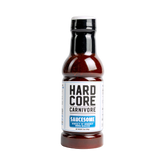 Hardcore Carnivore Saucesome BBQ Sauce — front of bottle on transparent background