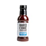 Hardcore Carnivore Saucesome BBQ Sauce — front of bottle on transparent background