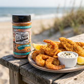 Elk Creek Southern Coastal Crunch seasoning — a platter of golden fried prawns and fish with lemon