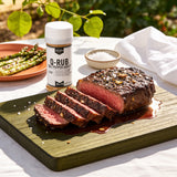 Lillie's Q Q-Rub Salt Pepper Garlic seasoning 224g — sliced medium-rare rump steak with a salt, pepper and garlic crust