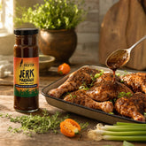 Little Brixton Jerk Marinade — chicken being marinated, bottle beside