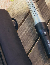 Looftlighter carry case beside a Looftlighter Classic on a timber deck