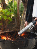 Looftlighter Classic in use, starting a charcoal kettle fire with no lighter fluid