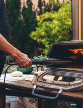 Looftlighter Pro lighting a backyard pizza oven