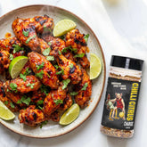 Low n Slow Basics Chilli Citrus Charge rub — grilled chicken wings in a chilli-citrus glaze with lime wedges