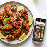 Low n Slow Basics Chilli Citrus Charge rub — grilled chicken wings in a chilli-citrus glaze with lime wedges
