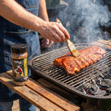 Low n Slow Basics Chilli Citrus Charge rub — pork ribs with a chilli-citrus rub basted on a backyard grill