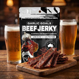 Low n Slow Basics Garlic Goals beef jerky — garlicky beef jerky strips fanned on a board with a beer