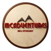 McAdventures brand logo, mountain emblem on a stitched leather badge, red lettering on transparent background